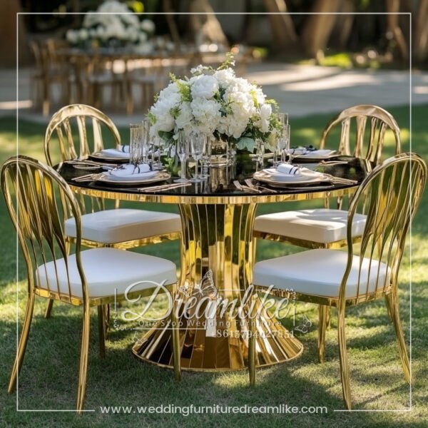 Sophisticated Round Dining Table with a Black Mirrored Top and Gold Frame