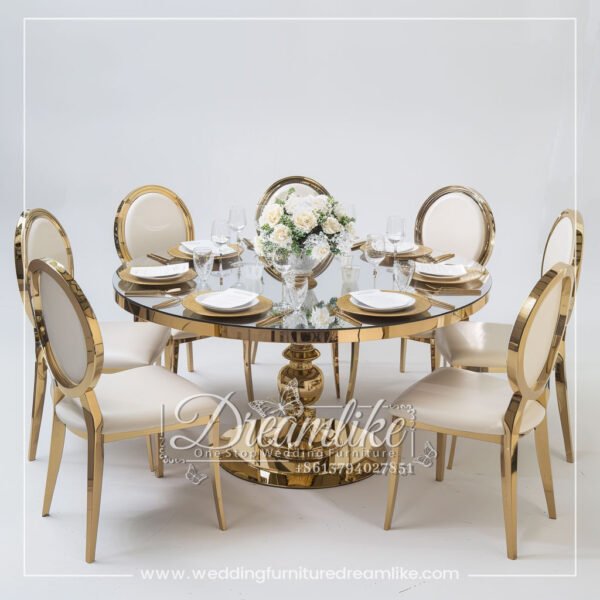 Sophisticated Round Dining Table with Gold Metal Base and Glass Surface