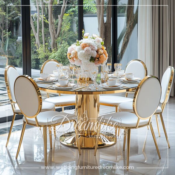 Modern Gold Pedestal Dining Table with Stunning Black Glass Top