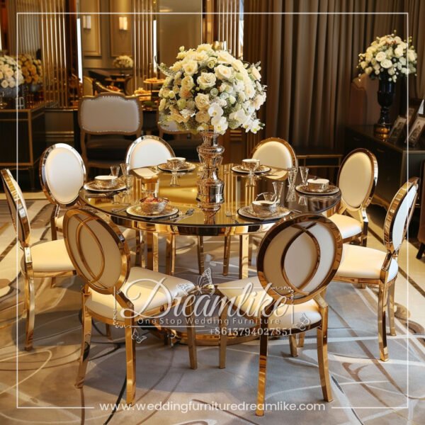 Stylish Mirror Glass Dining Table with Gold Pedestal for Upscale Occasions